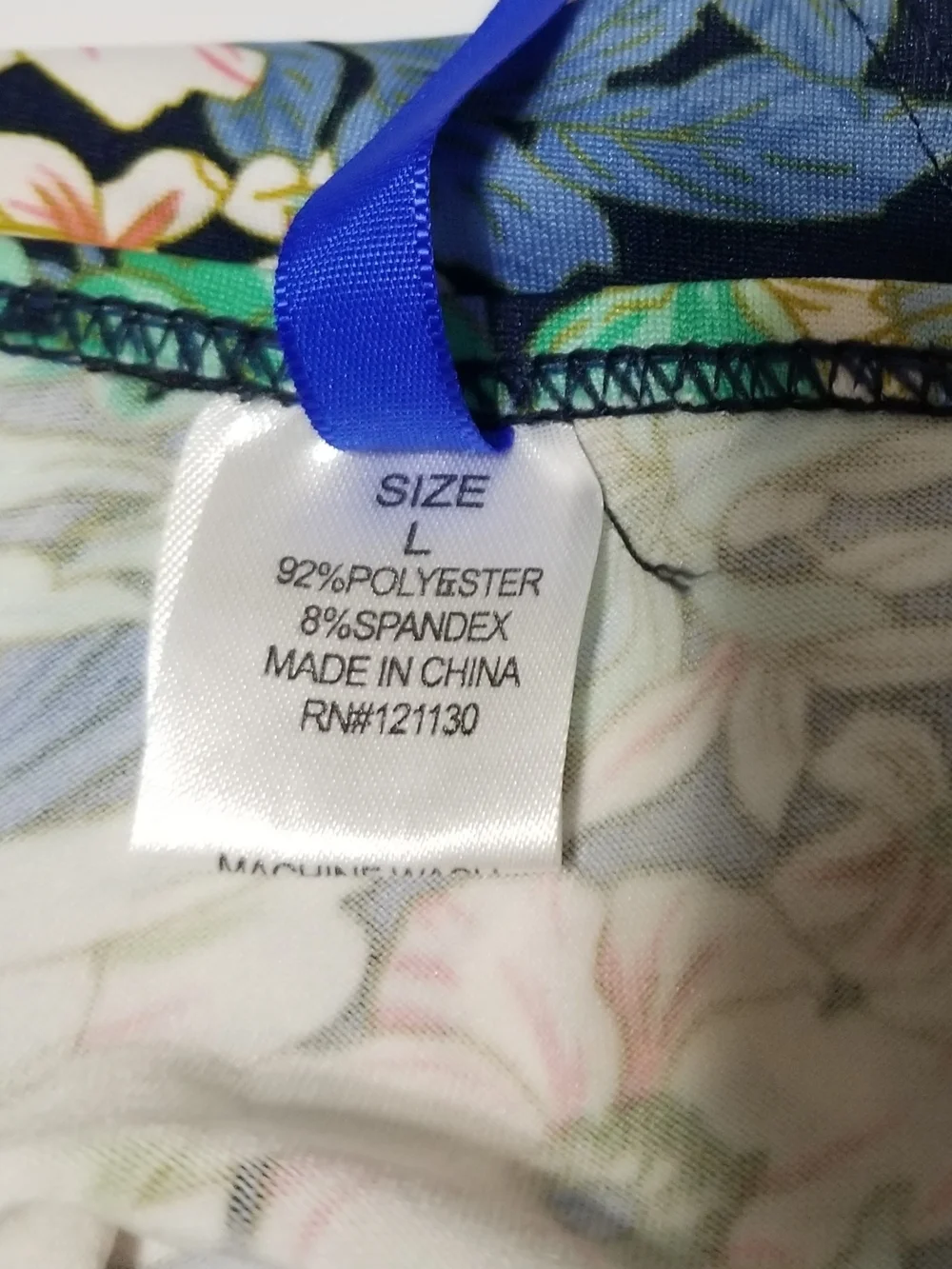 Prestige Kid’s Large Navy Two-Piece Bikini Set With A Multicolor Floral Pattern